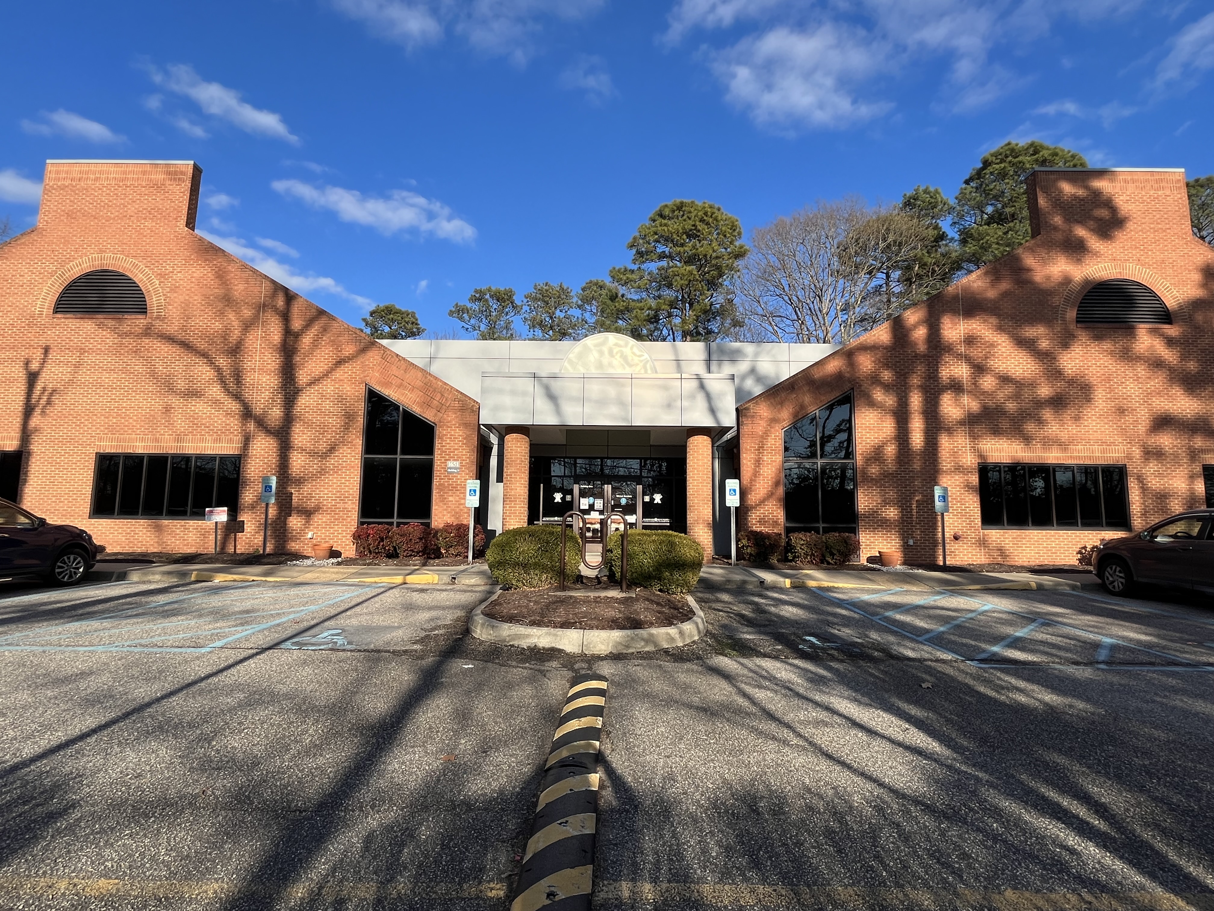 Williamsburg Office with two red brick buildings